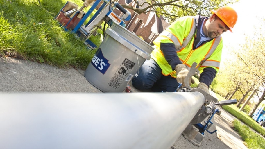 Sewer line worker